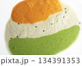 Closeup shot of tricolor chutney spread on a white background 134391353