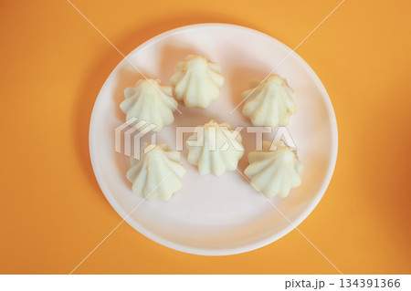 Six steamed sweet modak rice dumplings for Ganesh festival Six steamed sweet modak rice dumplings for Ganesh festival 134391366