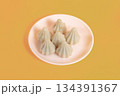 Six steamed sweet modak rice dumplings for Ganesh festival 134391367