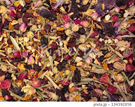 Herbal tea blend with buds, leaves, and fruit pieces in Istanbul bazaar. Wellness culture, natural ingredients, mindful consumption, and sensory balance through botanical diversity. Herbal tea blend with buds, leaves, and fruit pieces in Istanbul bazaar. Wellness culture, natural ingredients, mindful consumption, and sensory balance through botanical diversity. 134392856