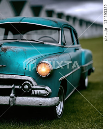 Close up View of an Old Turquoise Car With a Weathered Body Parked on Grass 134393329