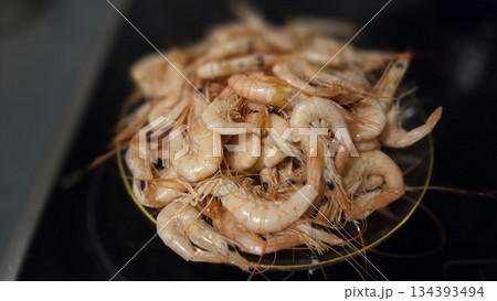 Fresh raw shrimps platter for seafood lovers and culinary delights 134393494