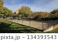 Outdoor beach volleyball court in urban park setting for recreation 134393543