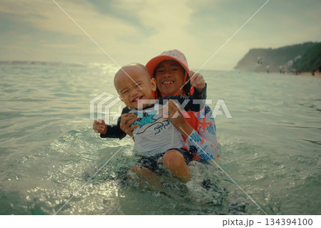 Joyful and Memorable Moments Spent at the Beach A Childs Delightful Playtime Experience 134394100