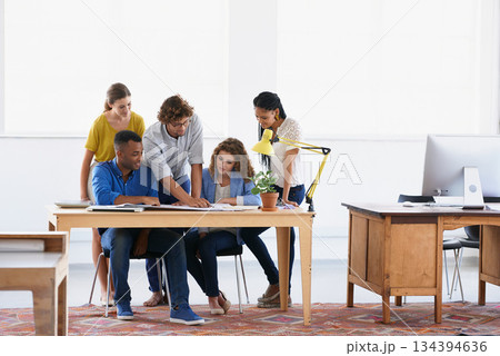 Diversity, business people and documents in project planning, team collaboration or strategy at the office. Group of employees in meeting working on paperwork in teamwork for plan at the workplace 134394636
