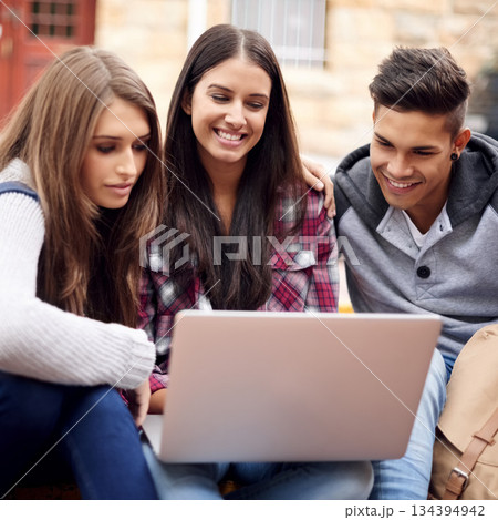 Students, laptop and research on campus for group project, diversity and online education in college. Learning, studying and happy friends at university with smile, internet and future opportunity. Students, laptop and research on campus for group project, diversity and online education in college. Learning, studying and happy friends at university with smile, internet and future opportunity. 134394942