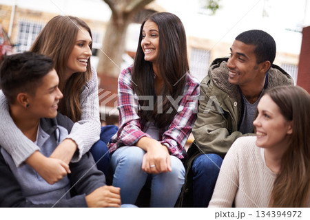 University, community and people chat on campus in conversation, talking and laughing outdoors. Diversity, education and happy men and women students smile for learning at school, academy and college University, community and people chat on campus in conversation, talking and laughing outdoors. Diversity, education and happy men and women students smile for learning at school, academy and college 134394972