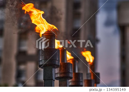 Hanukkah candles burning on menorah during Jewish holiday celebration Hanukkah candles burning on menorah during Jewish holiday celebration 134395149