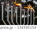 Hanukkah candles burning on menorah during Jewish holiday celebration 134395154