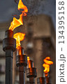 Hanukkah candles burning on menorah during Jewish holiday celebration 134395158