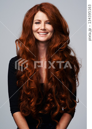 Red hair, happy and portrait of woman in studio for keratin treatment, wellness and haircare on white background. Salon, hairdresser and ginger female model with beauty, healthy and natural hairstyle 134395163