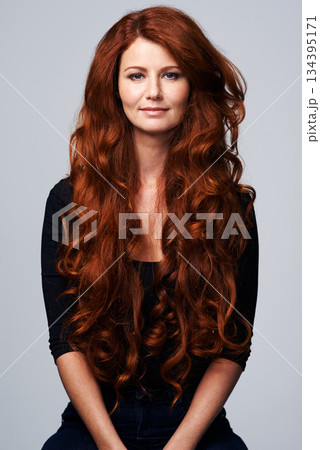 Ginger hair, beauty and portrait of woman in studio for hairdresser, wellness and haircare on white background. Salon, shine and female model with keratin treatment, healthy and natural hairstyle 134395171