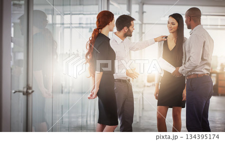 Business people, group and discussion in office corridor with men, women or diversity for strategy at startup. Businessman, leader or talk with advice, teamwork and brainstorming for company goal 134395174