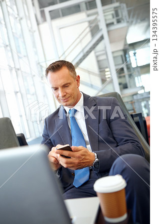 Business man, corporate travel and smartphone with senior executive and company communication with networking. Contact, online and email with CEO traveling to conference and waiting at airport Business man, corporate travel and smartphone with senior executive and company communication with networking. Contact, online and email with CEO traveling to conference and waiting at airport 134395575