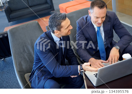 Teamwork, corporate or business men with laptop planning company growth, ideas and research in top view. Team, happy or corporate employee in office lounge for collaboration, search web or meeting Teamwork, corporate or business men with laptop planning company growth, ideas and research in top view. Team, happy or corporate employee in office lounge for collaboration, search web or meeting 134395576