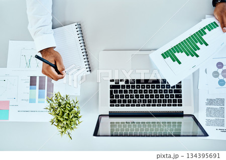 Man hands, documents and notebook writing, data analysis and website growth or planning on laptop or desk. Charts, graphs and stats paperwork of business person ideas, computer and seo research above Man hands, documents and notebook writing, data analysis and website growth or planning on laptop or desk. Charts, graphs and stats paperwork of business person ideas, computer and seo research above 134395691