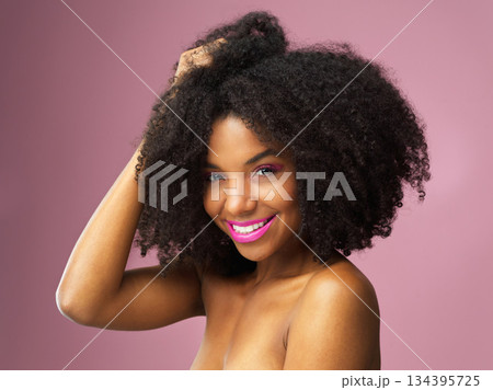 Face, hair care and happy black woman with afro in studio isolated on pink background. Hairstyle portrait, makeup cosmetics and African female model with salon treatment for beauty, growth or healthy Face, hair care and happy black woman with afro in studio isolated on pink background. Hairstyle portrait, makeup cosmetics and African female model with salon treatment for beauty, growth or healthy 134395725
