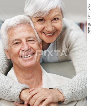 Senior, happy couple and portrait smile with hug for love, romance or embrace in relationship or marriage at home. Elderly woman face hugging man smiling for care or bonding together in retirement Senior, happy couple and portrait smile with hug for love, romance or embrace in relationship or marriage at home. Elderly woman face hugging man smiling for care or bonding together in retirement 134395777