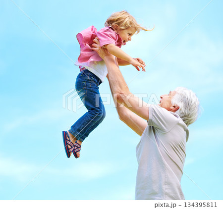 Fun, lifting and playful with grandfather and grandson for bonding, affectionate and free time. Love, smile and playing with old man and boy for family and generations on blue sky mockup space Fun, lifting and playful with grandfather and grandson for bonding, affectionate and free time. Love, smile and playing with old man and boy for family and generations on blue sky mockup space 134395811