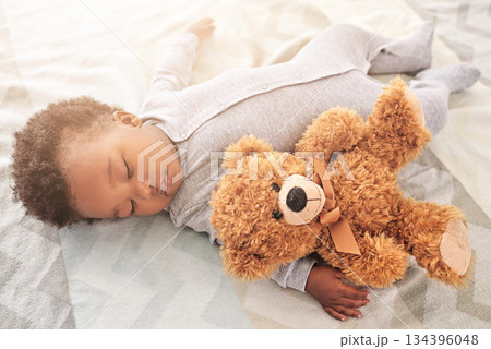 Sleeping, teddy bear and toy with baby in bedroom for carefree, development and innocence. Dreaming, relax and comfortable with african infant in nursery at home for morning, resting and bedtime Sleeping, teddy bear and toy with baby in bedroom for carefree, development and innocence. Dreaming, relax and comfortable with african infant in nursery at home for morning, resting and bedtime 134396048