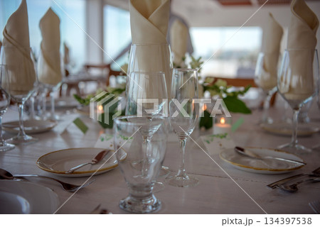 elegant banquet tables prepared for a conference or a party indoors elegant banquet tables prepared for a conference or a party indoors 134397538