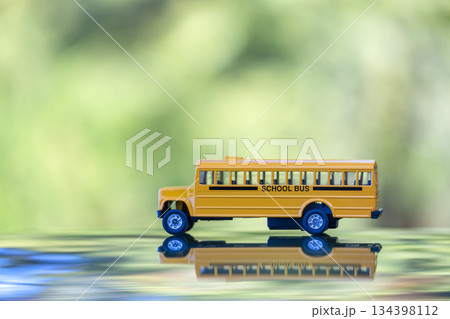 Toy american yellow school bus as symbol of education in the USA Toy american yellow school bus as symbol of education in the USA 134398112