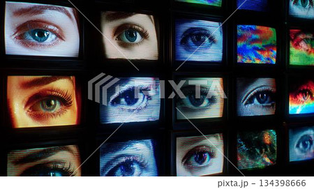 Eyes of different styles displayed on old retro television screens create a unique artistic composition in a dark setting Eyes of different styles displayed on old retro television screens create a unique artistic composition in a dark setting 134398666