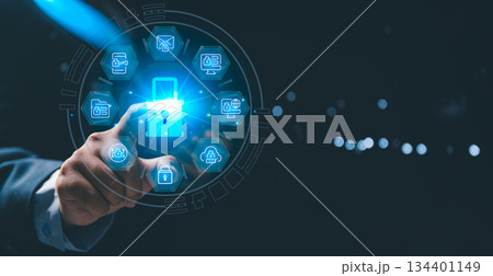 Business professional touching glowing holographic lock surrounded by security icons, cybersecurity, data protection, secure systems, digital privacy, advanced information security technology Business professional touching glowing holographic lock surrounded by security icons, cybersecurity, data protection, secure systems, digital privacy, advanced information security technology 134401149