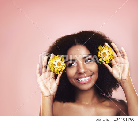 Woman, studio and thinking of flowers in hair on mockup background, floral aesthetic and sustainable choice. Happy face, african model and daisy plants in afro for beauty, ideas and natural skincare 134401760