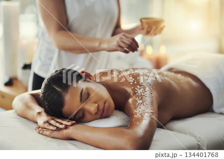 Woman, sleeping and relax in salt scrub massage at spa for skincare, exfoliation or body treatment. Calm female asleep or resting in relaxation for back therapy, health or zen with masseuse at salon Woman, sleeping and relax in salt scrub massage at spa for skincare, exfoliation or body treatment. Calm female asleep or resting in relaxation for back therapy, health or zen with masseuse at salon 134401768