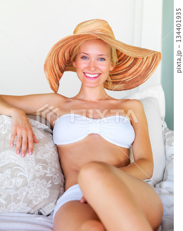 Relax, bikini and portrait of woman at hotel for sunbathing, summer break and tropical Bali vacation. Villa, resort and spa with girl lounge for wellness, travel destination and luxury on abroad trip 134401935