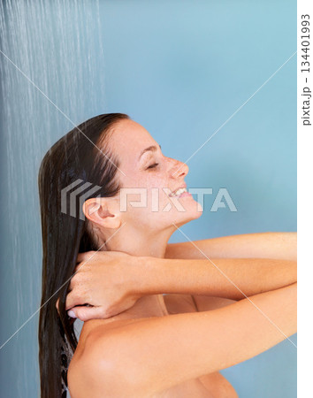 Happy, beauty and skincare of woman in shower for bathroom, hygiene and luxury. Wellness, spa and dermatology with face of girl for facial, cleaning and hydration isolated on blue background studio Happy, beauty and skincare of woman in shower for bathroom, hygiene and luxury. Wellness, spa and dermatology with face of girl for facial, cleaning and hydration isolated on blue background studio 134401993