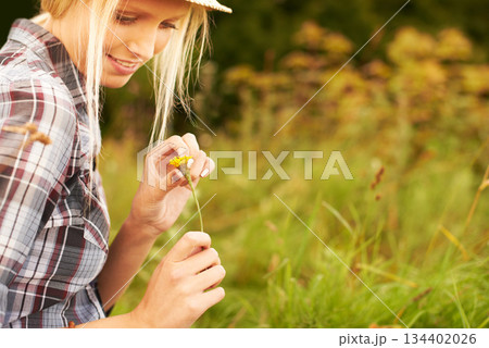 Spring, meadow and woman pick flower in field for freedom, wellness and fresh air outdoors. Nature, sunshine and happy hipster female person in countryside for relax, sustainability and ecology Spring, meadow and woman pick flower in field for freedom, wellness and fresh air outdoors. Nature, sunshine and happy hipster female person in countryside for relax, sustainability and ecology 134402026