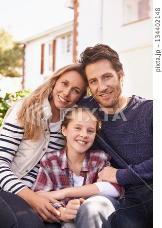 Backyard hug, family portrait and relax parents, child and people bonding, support and quality time outside home together. Love, happy faces and Canada mother, dad and kid enjoy care in garden 134402148