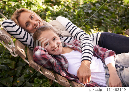 Portrait, hammock and relax happy kid, mom and family bond, care or spending quality time together. Wellness, support and Australia mother, child or people enjoy Mothers Day in backyard nature garden 134402149