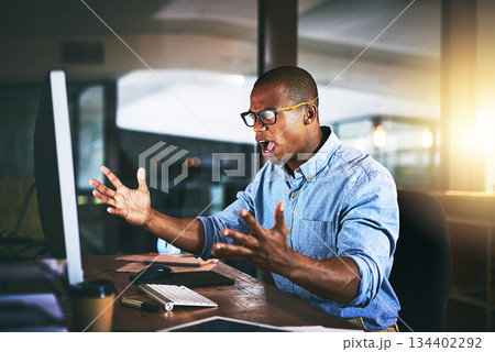 Black man in office, night and angry with computer glitch, stress with software problem. Male professional with anger, connection issue and working late, frustrated with 404 and business crisis 134402292