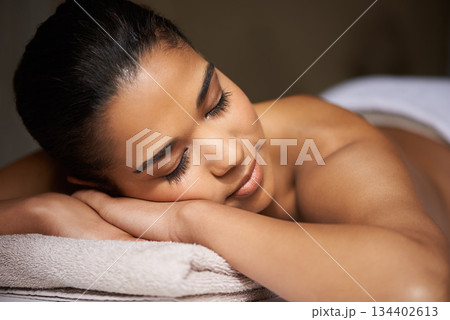 Girl client, sleeping or massage to relax for zen resting or wellness physical therapy in luxury skincare resort. Calm woman in salon to exfoliate for body healing treatment or natural holistic detox 134402613
