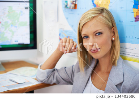 Portrait, travel agent and happy business woman confident in planning transport service, journey route or tour. Map, tourism industry and agency person with pride for destination recommendation 134402680