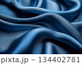 Smooth fabric drapes elegantly in captivating shades of blue for artistic textile design. Generative AI 134402781