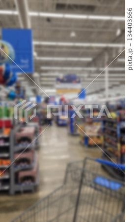defocused abstract blur background of supermarket, minimarket, major retailer or convenience store in America defocused abstract blur background of supermarket, minimarket, major retailer or convenience store in America 134403666