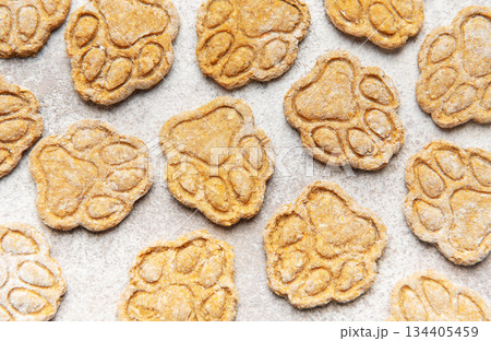 Homemade paw print dog treats baking pattern Homemade paw print dog treats baking pattern 134405459