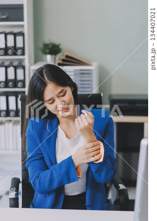 Asian women Aches from working She felt like relaxing Asian women Aches from working She felt like relaxing 134407021