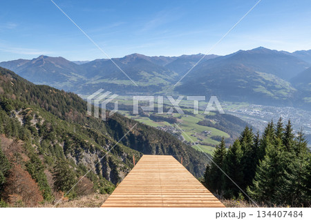Innsbruck, Austrian wooden path paraglider take off spot from the top of Alps in Austria Innsbruck, Austrian wooden path paraglider take off spot from the top of Alps in Austria 134407484