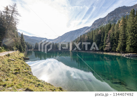 Summer time at romantic forest Lake Obernberg scenic mountain lakes landscape in Austria, Tyrol 134407492