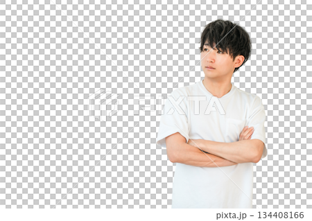 A young Asian man in a T-shirt thinking with his arms crossed (worried, worried, considering, troubled) A young Asian man in a T-shirt thinking with his arms crossed (worried, worried, considering, troubled) 134408166