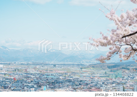 Tendo city with Sakura Cherry Blossom and snow mountain in Spring season, view from Tendo Park or Maizuru Park. Yamagata prefecture, Tohoku, Japan, 21 April 2025 Tendo city with Sakura Cherry Blossom and snow mountain in Spring season, view from Tendo Park or Maizuru Park. Yamagata prefecture, Tohoku, Japan, 21 April 2025 134408822