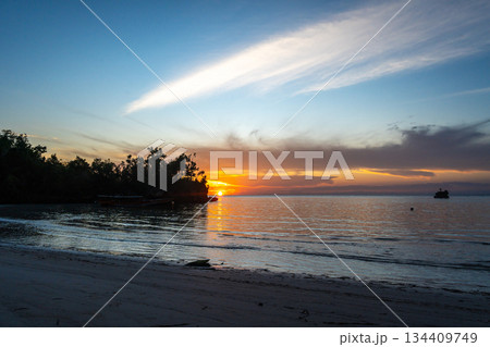 Sunset on Lia beach, Waleakodi Island, Togian archipelago, Sulawesi, Indonesia Sunset on Lia beach, Waleakodi Island, Togian archipelago, Sulawesi, Indonesia 134409749