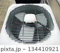 Outdoor HVAC units in winter snow 134410921