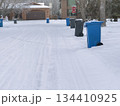 Winter Alley With Recycling Bins 134410925