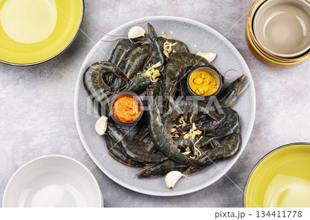 Raw scampi langoustines ready for cooking, flat lay. 134411778